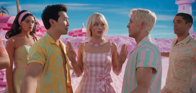 This image released by Warner Bros. Pictures shows, from left, Emma Mackey, Simu Liu, Margot Robbie, Ryan Gosling and Kingsley Ben-Adir in a scene from "Barbie." (Warner Bros. Pictures via AP)