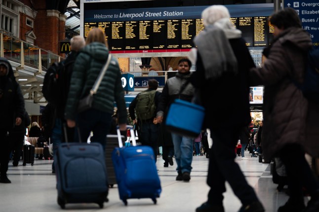 Passengers in Liverpool Street Station.