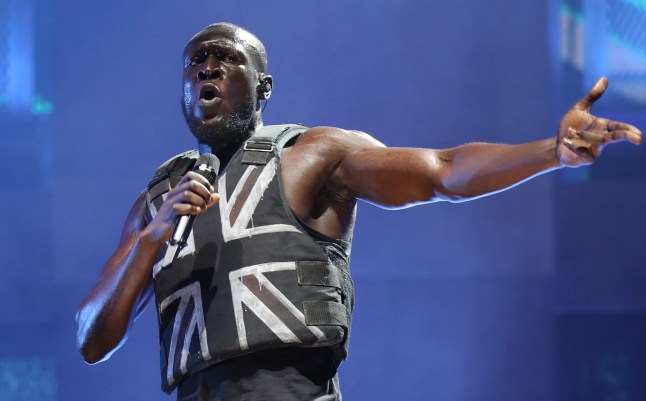 File photo 28/6/2019 of Stormzy performing on the Pyramid Stage during the Glastonbury Festival at Worthy Farm in Pilton, Somerset. A bullet-proof vest emblazoned with a Union flag by Banksy, similar to the one worn by Stormzy for his Glastonbury set, has been put up for sale with an estimate of ?200,000 to ?300,000. Sotheby's said it is the "first" Banksy vest to be auctioned from the collection, which the anonymous Bristol street artist began displaying in a shop window in Croydon in south London in 2019. Issue date: Monday September 30, 2024. PA Photo. See PA story SALE Banksy. Photo credit should read: Yui Mok/PA Wire