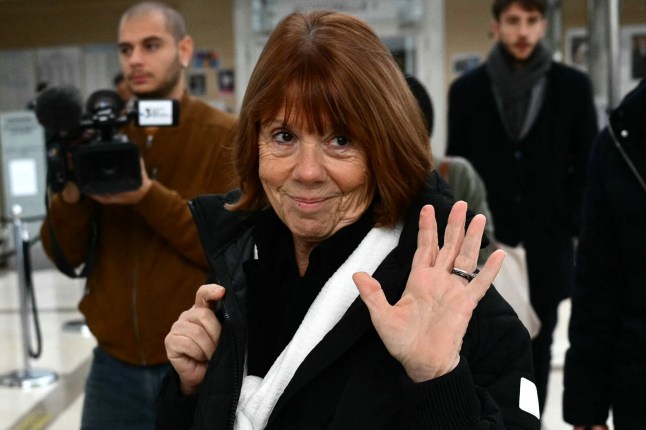 Gisele Pelicot waves as she arrives to the courthouse for the trial of her former partner Dominique Pelicot accused of drugging her for nearly ten years and inviting strangers to rape her at their home in Mazan, a small town in the south of France, in Avignon, on November 18, 2024. The trial enters its final stages, with the final set of accused set to testify ahead of sentencing requests later in the week and a verdict next month. The case of 71-year-old Dominique Pelicot has sparked horror, protests and a debate about male violence in French society. If convicted, he would emerge from the historic trial with a record as one of France's worst sex offenders. (Photo by Christophe SIMON / AFP) (Photo by CHRISTOPHE SIMON/AFP via Getty Images)