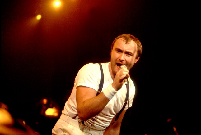 British Pop and Rock musician Phil Collins of the group Genesis performs onstage at the Rosemont Horizon, Rosemont, Illinois, November 11, 1983. (Photo by Paul Natkin/Getty Images)