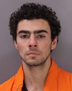 Luigi Mangione mug from Huntingdon SCI Luigi Mangione, 26, poses for his latest mugshot after being charged with the killing of UnitedHealthcare CEO Brian Thompson in New York. Mangione has been arrested on suspicion of carrying out the shooting in Pennsylvania. Pictured: Luigi Mangioni