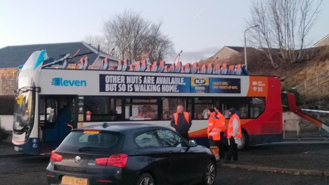 The scene in Culzean Crescent, Kilmarnock, where a double-decker bus crashed into a railway bridge. Picture date: Thursday December 19, 2024. PA Photo. See PA story POLICE Bus. Photo credit should read: Ryan McDougall/PA Wire